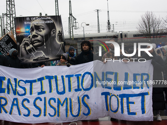 More than a thousand people take part in a demonstration against the latest court verdict over the police shooting that results in the death...