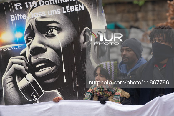 More than a thousand people take part in a demonstration against the latest court verdict over the police shooting that results in the death...