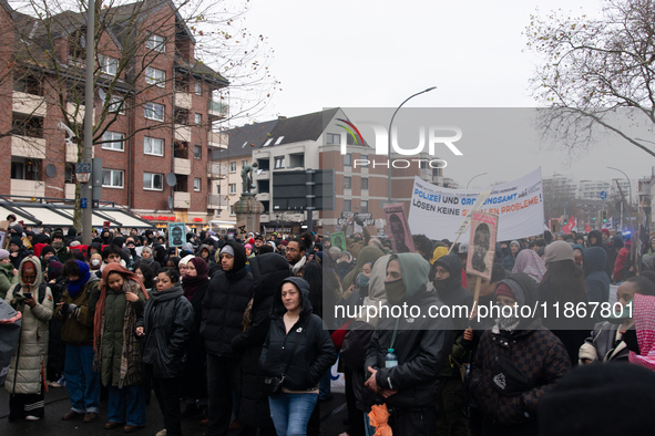 More than a thousand people take part in a demonstration against the latest court verdict over the police shooting that results in the death...