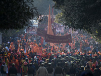 Hindu sadhus (holy men) from the Juna Akhara take part in a religious procession towards the Sangam area during the first entry for the Maha...