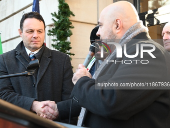 Mayor Andre Sayegh of Paterson, New Jersey, and Mayor Mohamed Khairullah of Prospect Park, New Jersey, host the Syrian Flag Raising Ceremony...