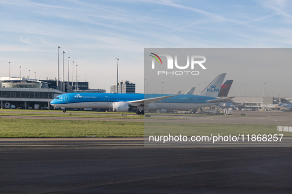 Aerial panoramic view of Amsterdam Airport Schiphol AMS EHAM and a Boeing 787-10 Dreamliner of KLM Royal Dutch Airlines with tail number PH-...