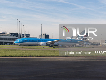 Aerial panoramic view of Amsterdam Airport Schiphol AMS EHAM and a Boeing 787-10 Dreamliner of KLM Royal Dutch Airlines with tail number PH-...