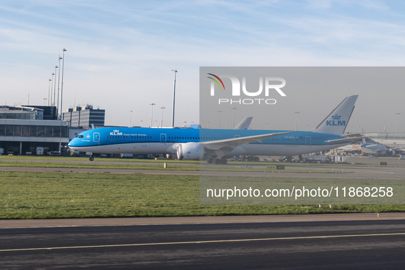 Aerial panoramic view of Amsterdam Airport Schiphol AMS EHAM and a Boeing 787-10 Dreamliner of KLM Royal Dutch Airlines with tail number PH-...