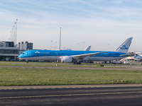 Aerial panoramic view of Amsterdam Airport Schiphol AMS EHAM and a Boeing 787-10 Dreamliner of KLM Royal Dutch Airlines with tail number PH-...