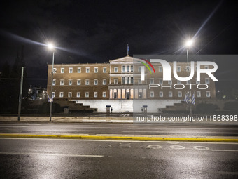 Night view of the Greek Parliament building officially known as The Parliament of the Hellenes or the Hellenic Parliament next to Syntagma S...