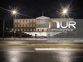 Night view of the Greek Parliament building officially known as The Parliament of the Hellenes or the Hellenic Parliament next to Syntagma S...