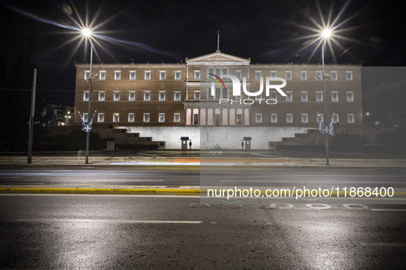 Night view of the Greek Parliament building officially known as The Parliament of the Hellenes or the Hellenic Parliament next to Syntagma S...