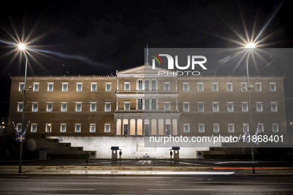 Night view of the Greek Parliament building officially known as The Parliament of the Hellenes or the Hellenic Parliament next to Syntagma S...