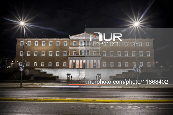 Night view of the Greek Parliament building officially known as The Parliament of the Hellenes or the Hellenic Parliament next to Syntagma S...