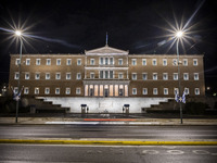 Night view of the Greek Parliament building officially known as The Parliament of the Hellenes or the Hellenic Parliament next to Syntagma S...