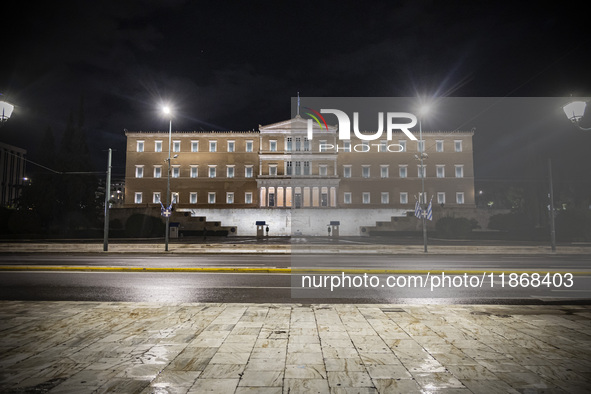 Night view of the Greek Parliament building officially known as The Parliament of the Hellenes or the Hellenic Parliament next to Syntagma S...