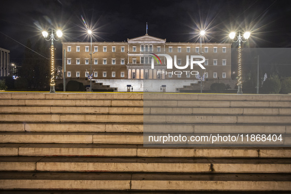 Night view of the Greek Parliament building officially known as The Parliament of the Hellenes or the Hellenic Parliament next to Syntagma S...