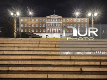 Night view of the Greek Parliament building officially known as The Parliament of the Hellenes or the Hellenic Parliament next to Syntagma S...