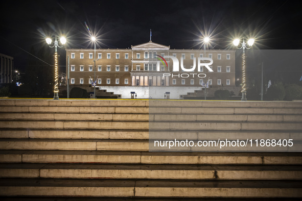 Night view of the Greek Parliament building officially known as The Parliament of the Hellenes or the Hellenic Parliament next to Syntagma S...