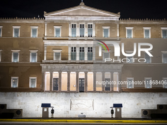 Night view of the Greek Parliament building officially known as The Parliament of the Hellenes or the Hellenic Parliament next to Syntagma S...