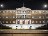 Night view of the Greek Parliament building officially known as The Parliament of the Hellenes or the Hellenic Parliament next to Syntagma S...