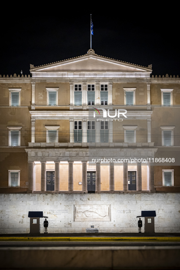 Night view of the Greek Parliament building officially known as The Parliament of the Hellenes or the Hellenic Parliament next to Syntagma S...