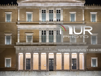 Night view of the Greek Parliament building officially known as The Parliament of the Hellenes or the Hellenic Parliament next to Syntagma S...