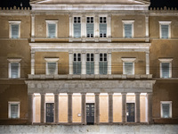 Night view of the Greek Parliament building officially known as The Parliament of the Hellenes or the Hellenic Parliament next to Syntagma S...