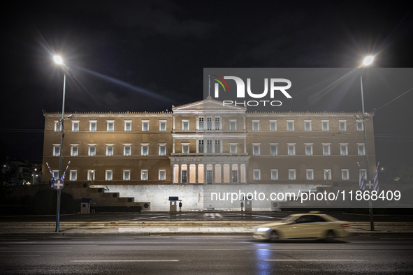 Night view of the Greek Parliament building officially known as The Parliament of the Hellenes or the Hellenic Parliament next to Syntagma S...