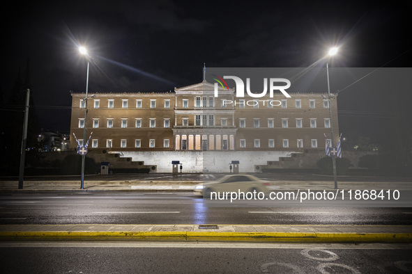 Night view of the Greek Parliament building officially known as The Parliament of the Hellenes or the Hellenic Parliament next to Syntagma S...