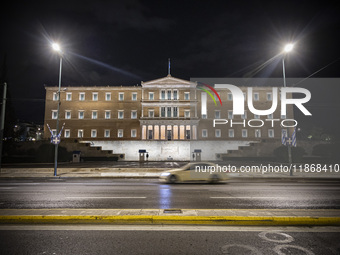 Night view of the Greek Parliament building officially known as The Parliament of the Hellenes or the Hellenic Parliament next to Syntagma S...