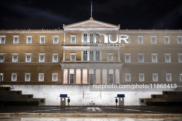 Night view of the Greek Parliament building officially known as The Parliament of the Hellenes or the Hellenic Parliament next to Syntagma S...