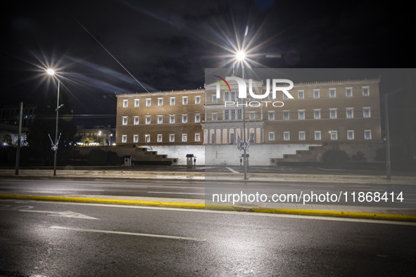 Night view of the Greek Parliament building officially known as The Parliament of the Hellenes or the Hellenic Parliament next to Syntagma S...