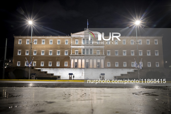 Night view of the Greek Parliament building officially known as The Parliament of the Hellenes or the Hellenic Parliament next to Syntagma S...