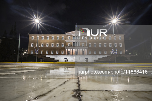 Night view of the Greek Parliament building officially known as The Parliament of the Hellenes or the Hellenic Parliament next to Syntagma S...