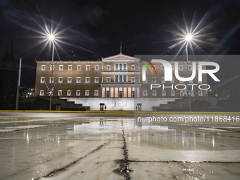 Night view of the Greek Parliament building officially known as The Parliament of the Hellenes or the Hellenic Parliament next to Syntagma S...