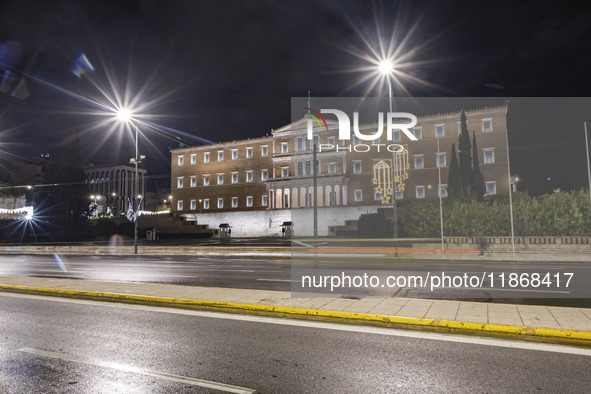 Night view of the Greek Parliament building officially known as The Parliament of the Hellenes or the Hellenic Parliament next to Syntagma S...