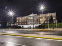 Night view of the Greek Parliament building officially known as The Parliament of the Hellenes or the Hellenic Parliament next to Syntagma S...