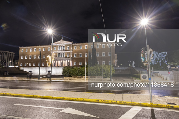 Night view of the Greek Parliament building officially known as The Parliament of the Hellenes or the Hellenic Parliament next to Syntagma S...