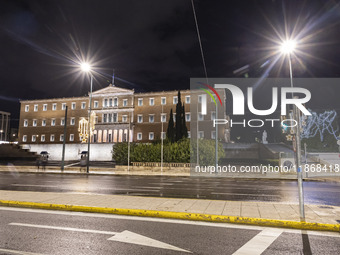 Night view of the Greek Parliament building officially known as The Parliament of the Hellenes or the Hellenic Parliament next to Syntagma S...