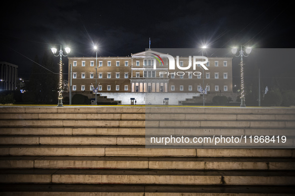 Night view of the Greek Parliament building officially known as The Parliament of the Hellenes or the Hellenic Parliament next to Syntagma S...