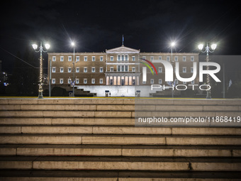 Night view of the Greek Parliament building officially known as The Parliament of the Hellenes or the Hellenic Parliament next to Syntagma S...