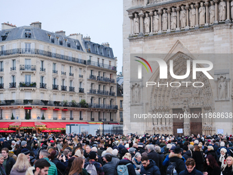 A few days after the reopening of Notre-Dame, people rush to observe or visit the renovated cathedral. (