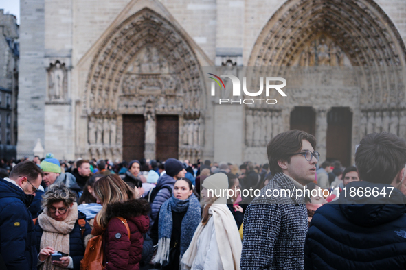 The forecourt of Notre-Dame reopens to tourists and Parisians after five years of closure. 