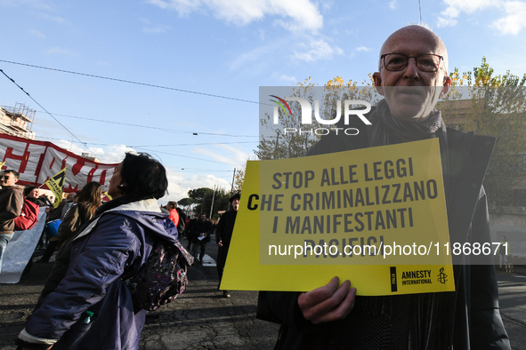 Riccardo Noury, spokesperson for Amnesty International Italy, participates in the national demonstration against the security bill, which in...