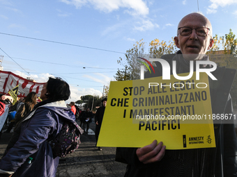 Riccardo Noury, spokesperson for Amnesty International Italy, participates in the national demonstration against the security bill, which in...