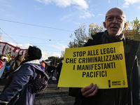 Riccardo Noury, spokesperson for Amnesty International Italy, participates in the national demonstration against the security bill, which in...