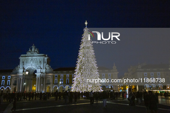 A general view shows the Christmas lights at Praca do Comercio in Lisbon, Portugal, on December 14, 2024. The Christmas lights in Lisbon are...