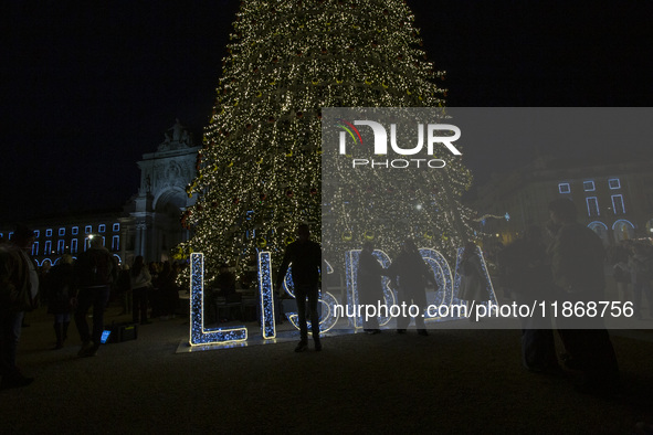 A drone captures the Christmas lights at Praca do Comercio in Lisbon, Portugal, on December 14, 2024. The Christmas lights in Lisbon are off...