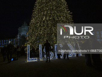 A drone captures the Christmas lights at Praca do Comercio in Lisbon, Portugal, on December 14, 2024. The Christmas lights in Lisbon are off...