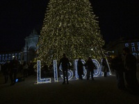 A drone captures the Christmas lights at Praca do Comercio in Lisbon, Portugal, on December 14, 2024. The Christmas lights in Lisbon are off...