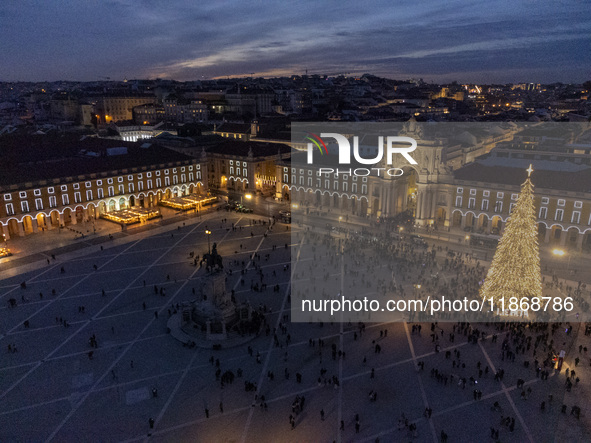 A drone captures the Christmas lights at Praca do Comercio in Lisbon, Portugal, on December 14, 2024. The Christmas lights in Lisbon are off...