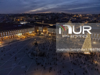 A drone captures the Christmas lights at Praca do Comercio in Lisbon, Portugal, on December 14, 2024. The Christmas lights in Lisbon are off...