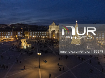 A drone captures the Christmas lights at Praca do Comercio in Lisbon, Portugal, on December 14, 2024. The Christmas lights in Lisbon are off...